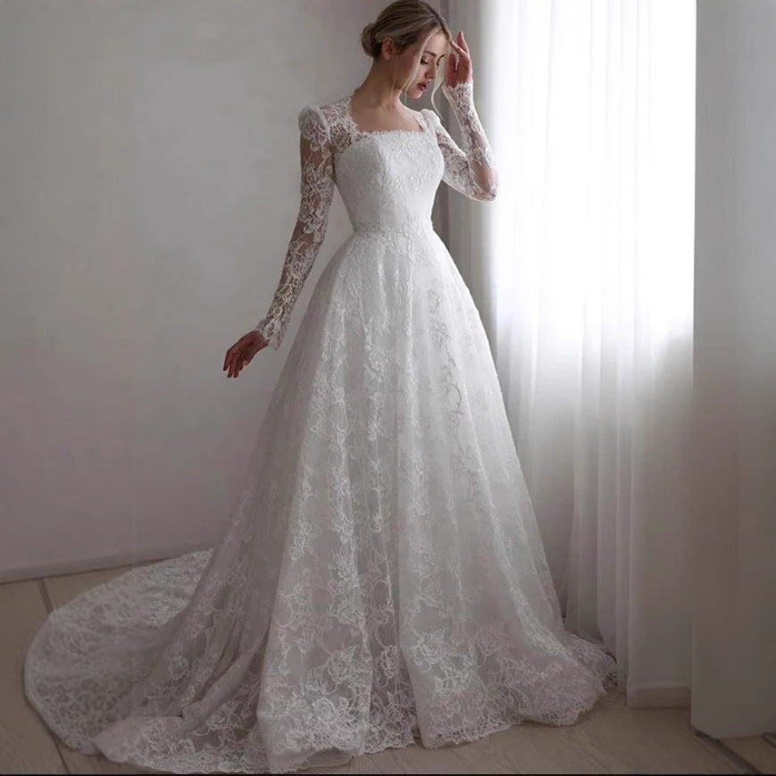 Embroidered Long Sleeve Trailing Wedding Dress Ivory GlamzKart