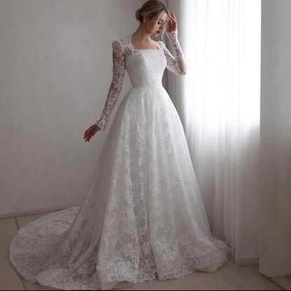 Embroidered Long Sleeve Trailing Wedding Dress Ivory GlamzKart