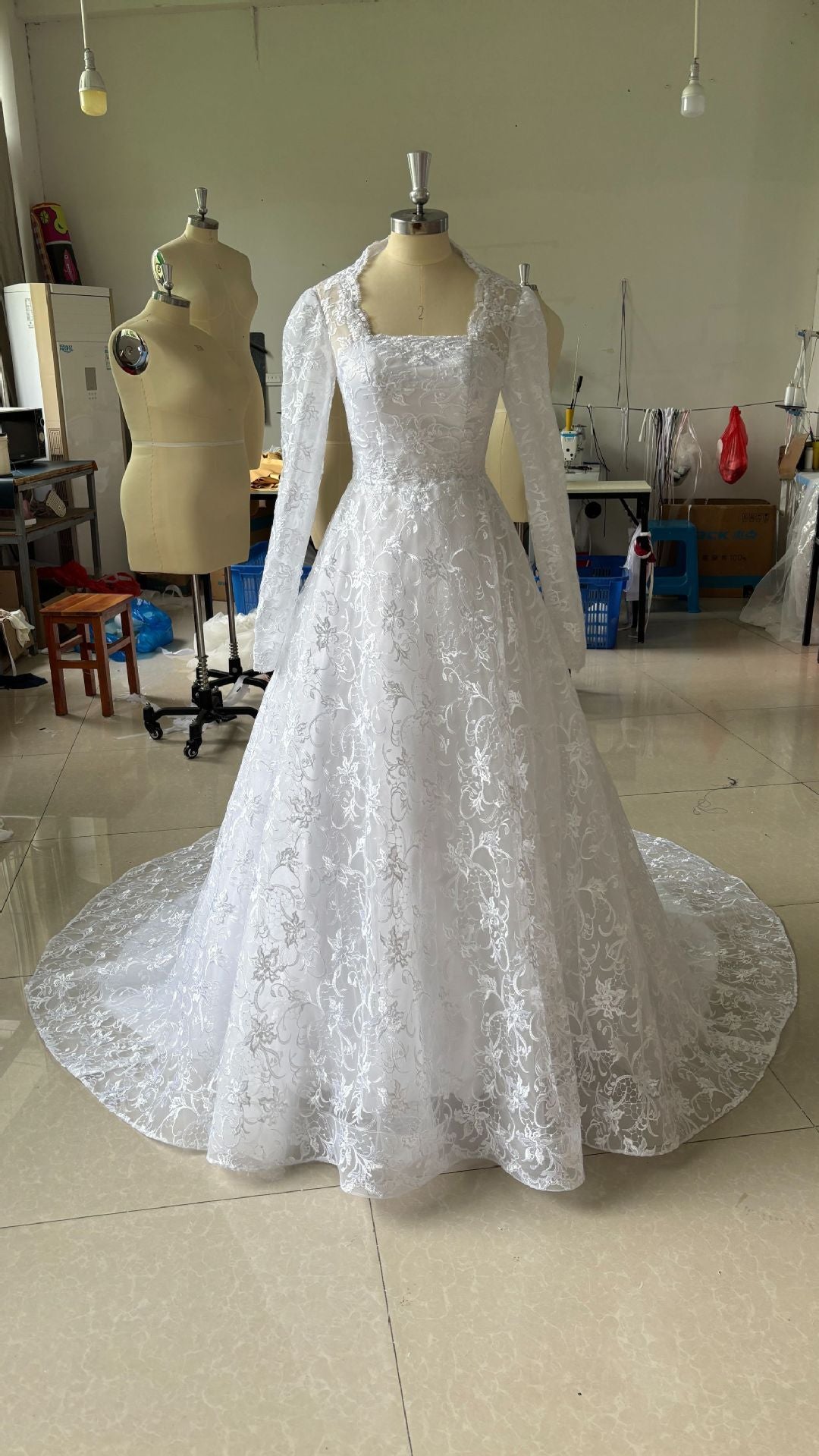 Embroidered Long Sleeve Trailing Wedding Dress GlamzKart