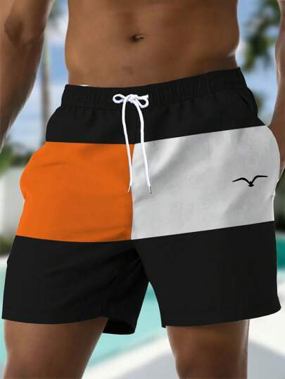 Printed Drawstring Waist Diagonal Pocket Casual Pants Orange White GlamzKart