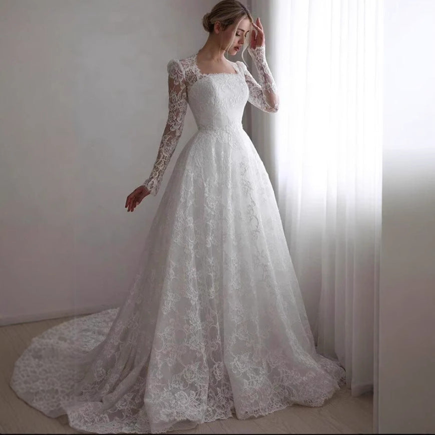 Embroidered Long Sleeve Trailing Wedding Dress GlamzKart